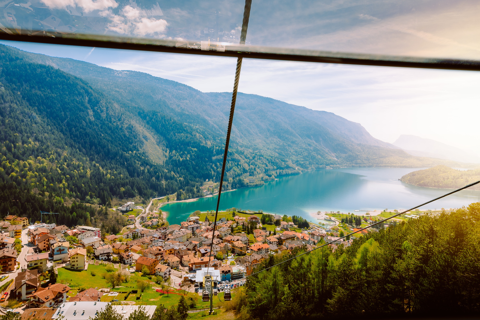 Top view of the town of Molveno and its lake from the funicular railway to the Pradel Plateau